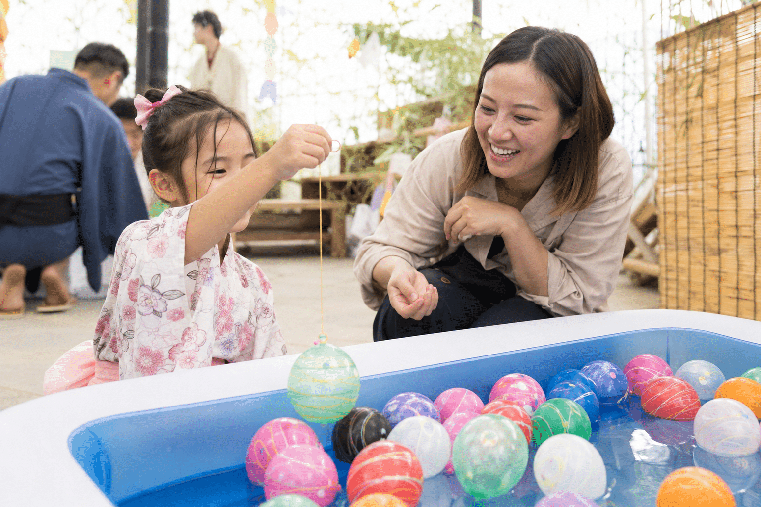 A child enjoying Japanese yo-yo fishing